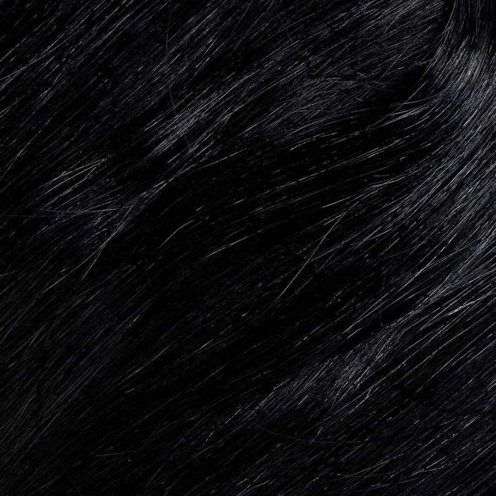 Close-up of the Black hair color, showing the natural depth and shine of the Remy Human Hair shade.