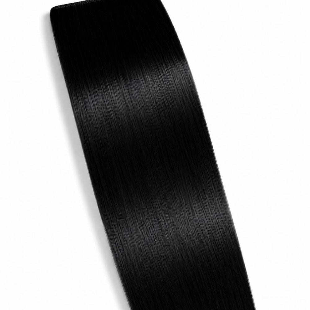 A Black ponytail hair extension displayed on a clean white background, showing its smooth Remy Human Hair texture.