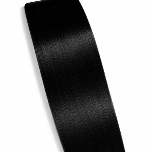 A Black ponytail hair extension displayed on a clean white background, showing its smooth Remy Human Hair texture.
