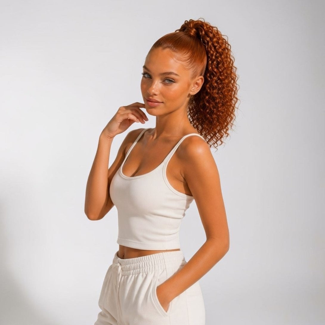 Ginger copper human hair ponytail extension in a warm red copper shade