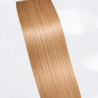 Honey blonde human hair ponytail extension in a warm golden blonde shade