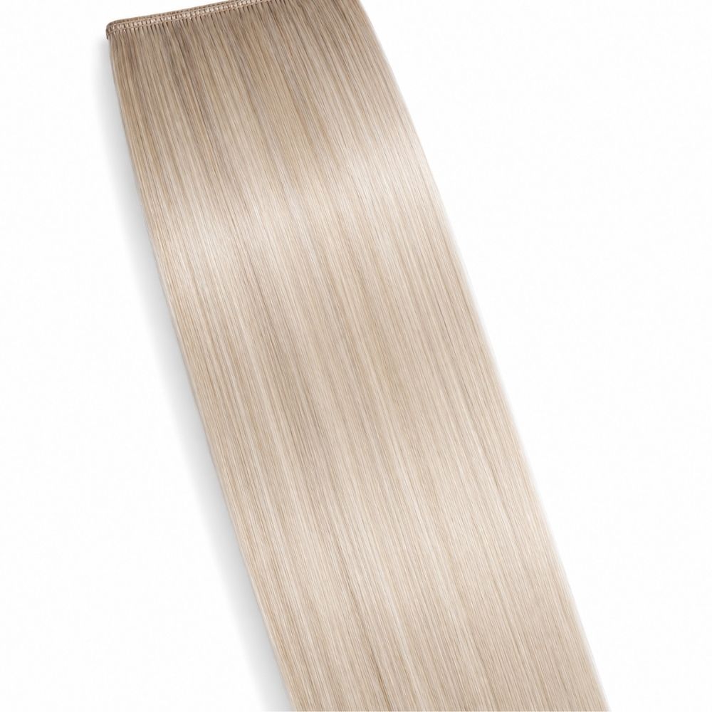 An Ice Blonde ponytail hair extension displayed on a clean white background, showing its smooth Remy Human Hair texture.
