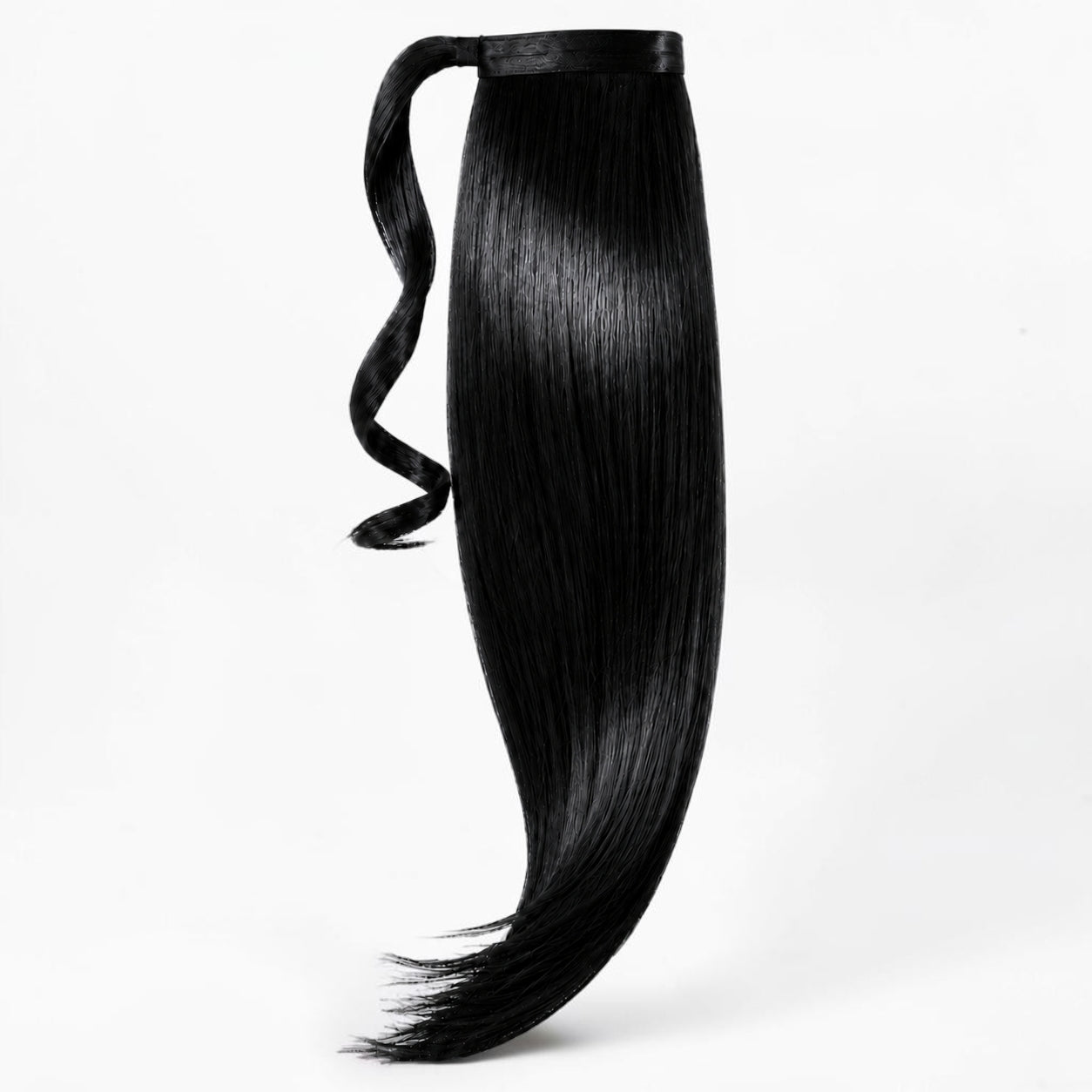 Jet Black variant of Remy human hair ponytail extension, showing the full wrap-around ponytail.